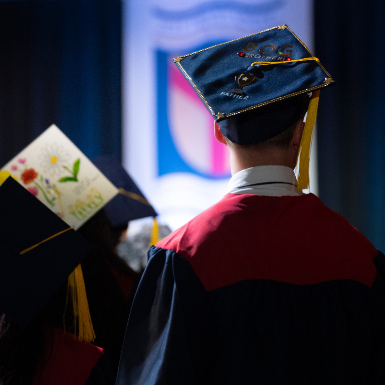 Graduate with graduation cap