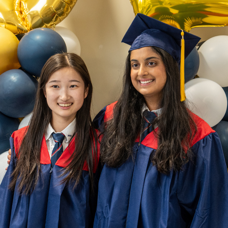 Students picture in their graduation gowns